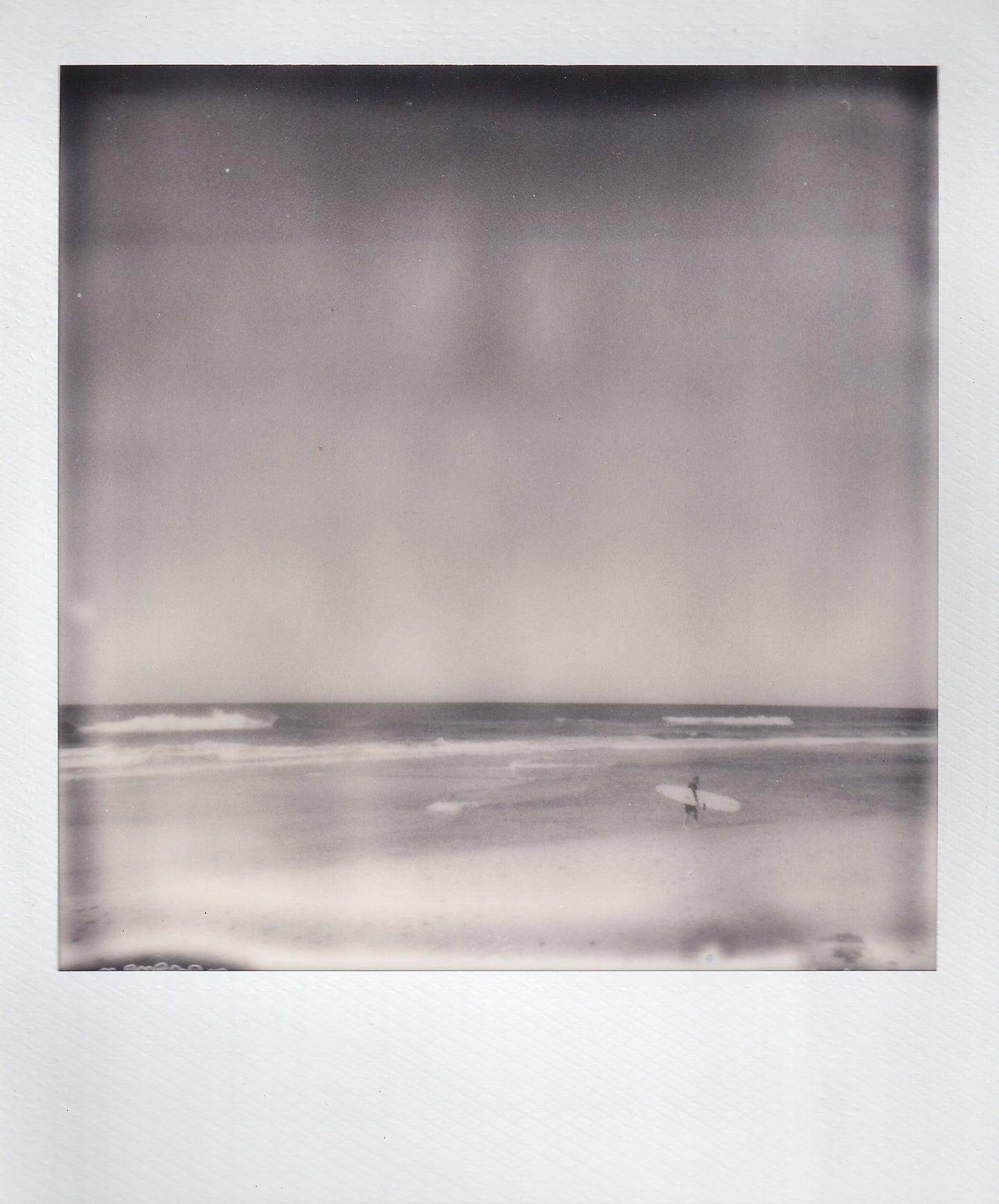 SURFER AT SUNRISE BEACH